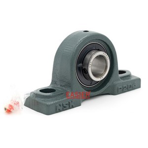 Pillow block bearing for agricultural machinery